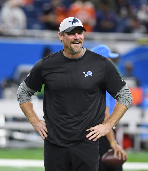 Lions head coach Dan Campbell comes onto the field for the game against the Chicago Bears.