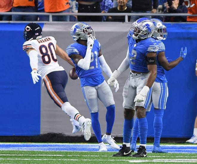 The Lions' Austin Bryant yells out after Bears tight end Jimmy Graham pulls in a touchdown reception in the end zone in the second quarter.
