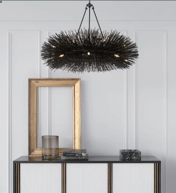 This Visual Comfort Strada Ring Chandelier by Kelly Wearstler lends a sculptural effect to any room.