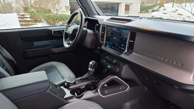 A 12-inch dash screen dominates the handsome horizontal interior of the 2021 Ford Bronco 2-door.