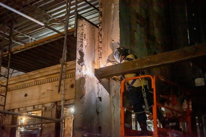 A worker welds steel as construction continues at the Michigan Central Station, owned by Ford, in Detroit, January 11, 2022.