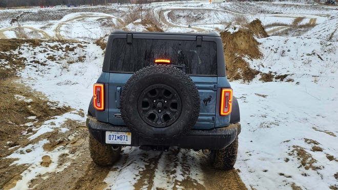 The 2021 Ford Bronco 2-door comes with full spare tire hanging off the rear gate.