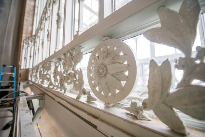 Rosettes 3d printed from resin from a digital scan of cast iron originals can be seen adorning the windows on the ground floor. The new ones weigh substantially less than the iron originals. The decorations will adorn the windows on the ground floor. Construction continues at the Michigan Central Station, owned by Ford, in Detroit, January 11, 2022.