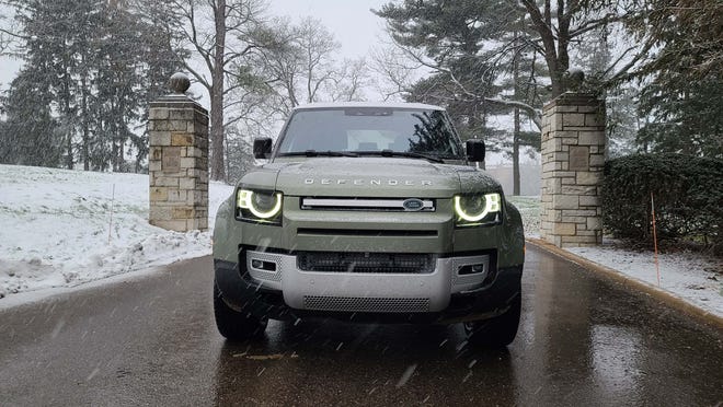 The distinctive front end of the 2021 Land Rover Defender 90 shares ringed headlights with the Ford Bronco.