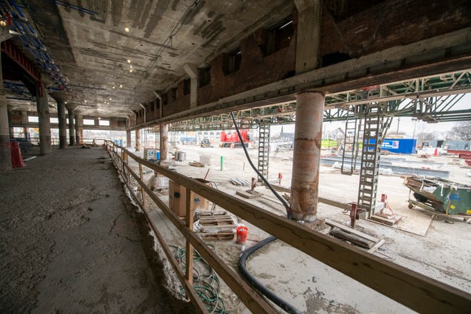Construction continues at the former book depository now owned by Ford, in Detroit, January 11, 2022.