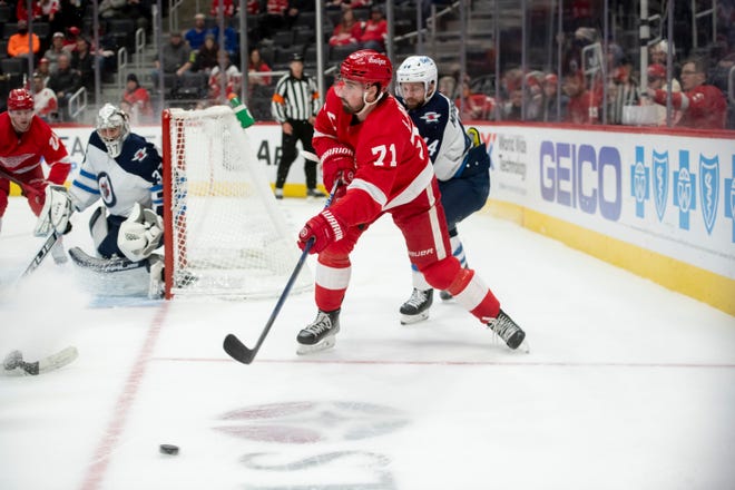 Detroit center Dylan Larkin passes the puck during the first period.