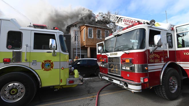 According to Orion Twp. Fire Chief Rob Duke, at least four fire departments and three ladder trucks battled a fire at 35 N. Broadway in historic downtown Lake Orion on Friday, Jan. 14, 2022. The building, built in 1894, is a former boarding house.