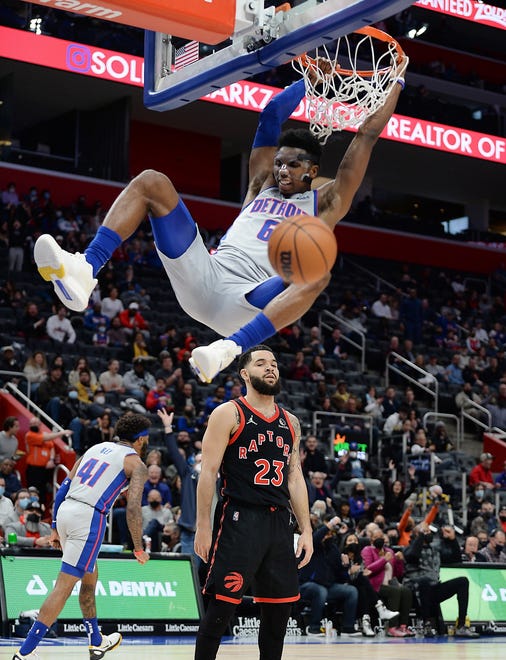 Detroit Pistons guard Hamidou Diallo (6) dunks over Toronto Raptors guard Fred VanVleet (23) in the first quarter. Diallo had 18 points and 6 rebounds. The Pistons defeated the Raptors 103-87, Friday, January 14, 2022 at Little Caesars Arena, in Detroit, Michigan.