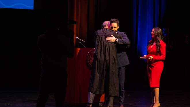 The first Arab-American and Muslim mayor, Abdullah Hammoud, embraces Judge Helal A Farhat during City of Dearborn Inauguration Ceremony in Dearborn, Michigan on Saturday January 15th 2022.