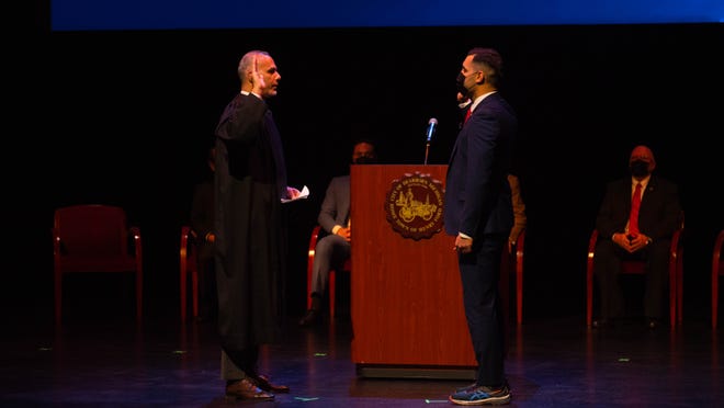 Judge Helal A Farhat swears in Councilman Kamal Alsawafy at the City of Dearborn Inauguration Ceremony in Dearborn, Michigan on Saturday January 15th 2022.