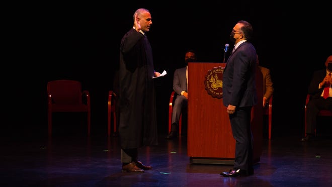 Judge Helal A Farhat swears in Councilman Michael T. Sareini at the City of Dearborn Inauguration Ceremony in Dearborn, Michigan on Saturday January 15th 2022.