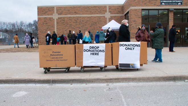 Donations were taken at the MLK freedom walk in Royal Oak, Michigan, on January 17, 2022.