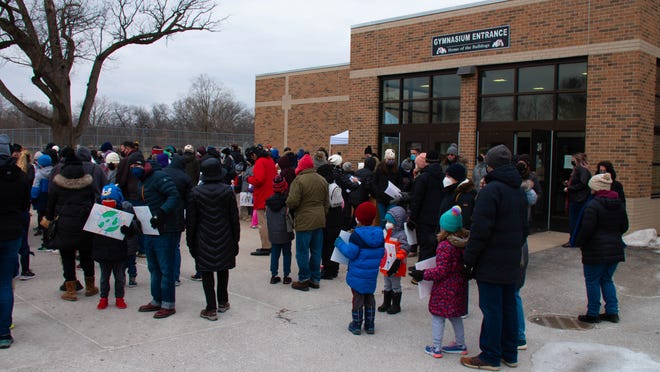 Many gather at the Royal Oak Middle School for the freedom walk in celebration of Martin Luther King Day on Monday, January 17, 2022, in Royal Oak, Michigan.