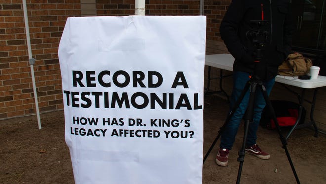 Some attendees of the freedom walk recorded testimonials of how the Rev. Martin Luther King Jr.'s legacy affected them at the Royal Oak Middle School in Royal Oak, Michigan, on Monday January 17, 2022.