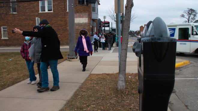 Walkers came out on a frigid Monday to attend the MLK freedom walk in Royal Oak, Michigan, on January 17, 2022.