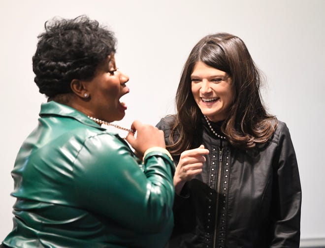 U.S. Rep. Haley Stevens talks with Pontiac District 1 Councilwoman Melanie Rutherford at the Rev. Martin Luther King Jr. 30th annual luncheon at St. George's Cultural Center in Pontiac, Michigan, on January 17, 2022.