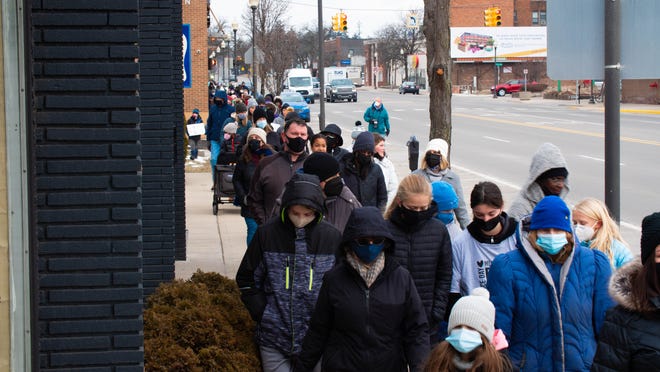 Walkers came out on this frigid Monday to attend the MLK freedom walk in Royal Oak, Michigan, on January 17, 2022.