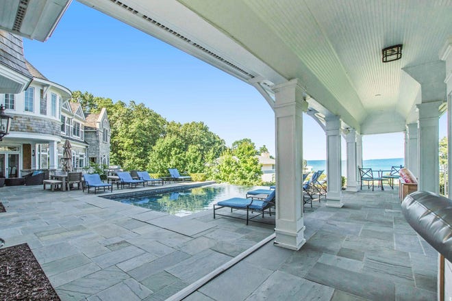 The property has an infinity pool and views of Lake Michigan.