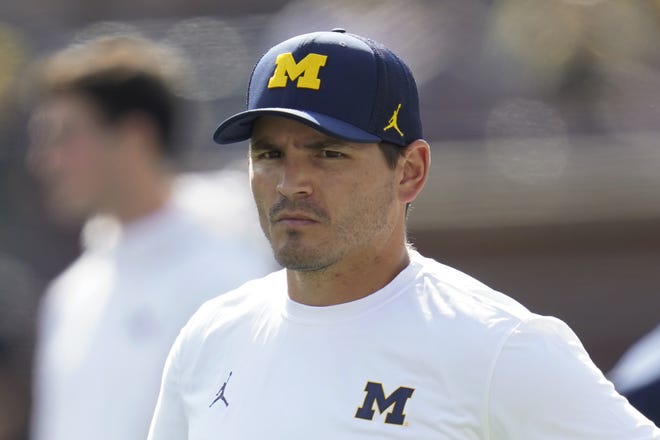 Michigan defensive coordinator Mike Macdonald is returning to the Baltimore Ravens as their defensive coordinator.