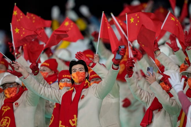 The team from China arrives during the opening ceremony of the 2022 Winter Olympics, Friday, Feb. 4, 2022, in Beijing.