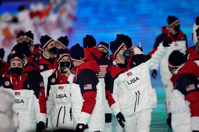 The team from the United States arrives during the opening ceremony of the 2022 Winter Olympics, Friday, Feb. 4, 2022, in Beijing.