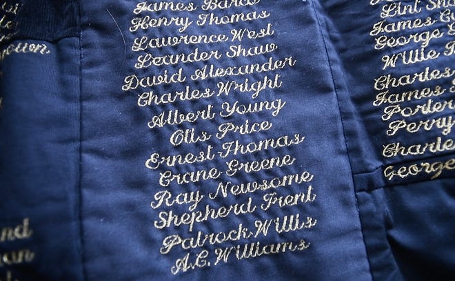 Some of the 5,000 names on a quilt entitled "Strange Fruit," by artist April Anue Shipp, of the men, women and children lynched in the United States.