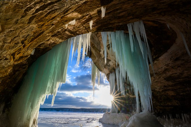 The sun peeks inside a cave on Grand Island, in Lake Superior, near Munising, MI., Thursday, March 3, 2022.