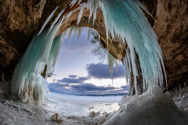 Ice forms inside a cave on Grand Island, in Lake Superior, near Munising, MI., Thursday, March 3, 2022.