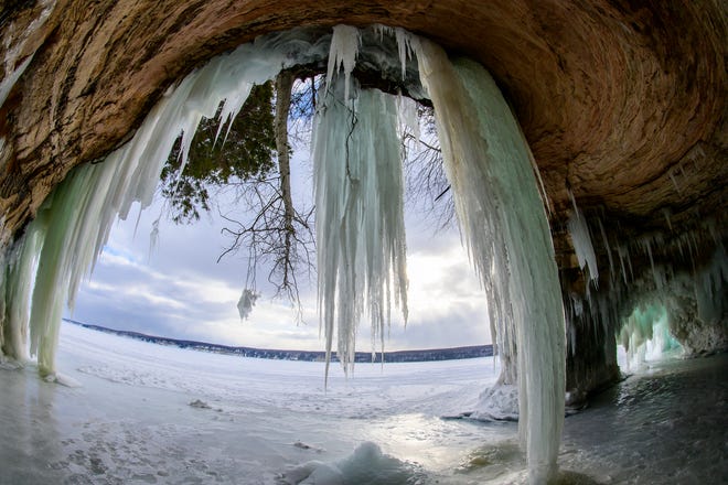 Ice forms from a cave on Grand Island, in Lake Superior, near Munising, MI., Thursday, March 3, 2022.