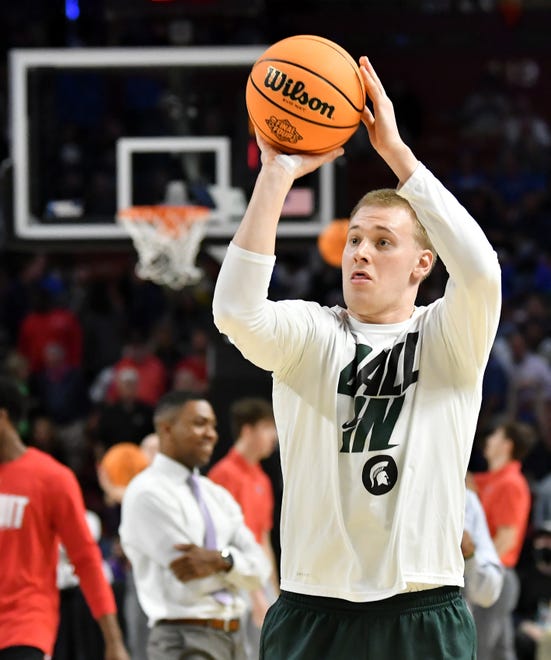 Michigan State forward Joey Hauser shoots the ball during warm ups before the game.