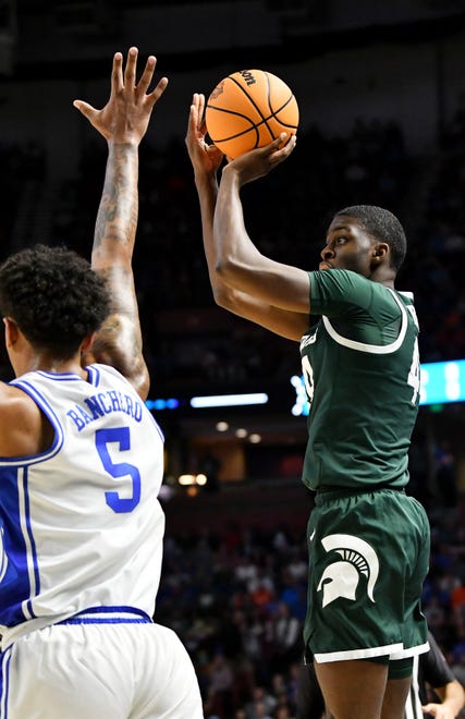 Michigan State forward Gabe Brown (44) shoots over Duke forward Paolo Banchero (5) in the second half.