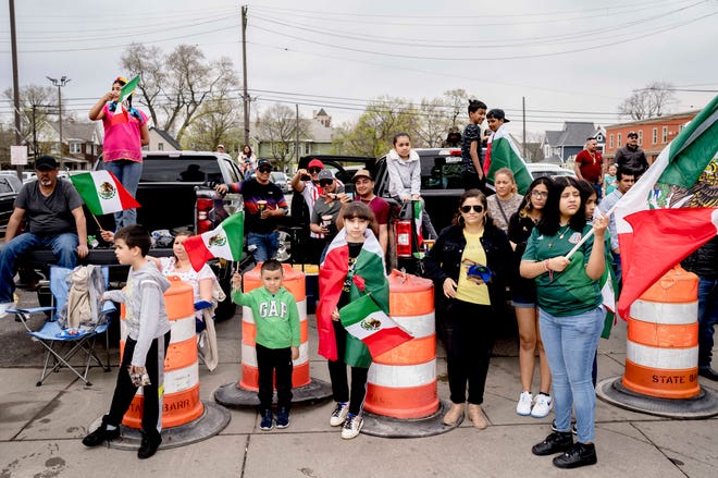 People watch during the 57th annual Cinco de Mayo Parade in Detroit on May 1, 2022.