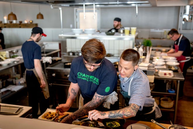 Line cook Cole Lauri, left, and chef Phoebe Zimmerman work in the kitchen at Freya in Detroit on May 7, 2022.