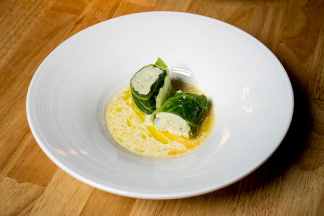 Dover sole with shrimp mousseline and coconut lemongrass broth is pictured at Freya in Detroit on May 7, 2022.