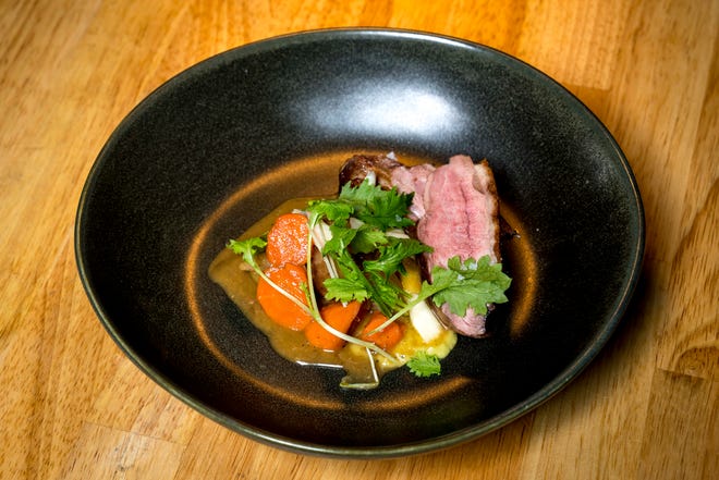 Rohan duck breast with bone marrow fricassee is pictured at Freya in Detroit on May 7, 2022.