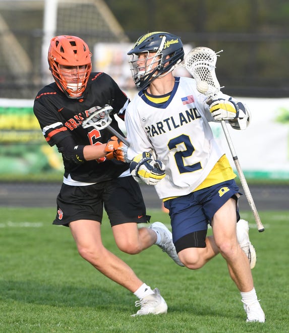 Brigthon's Lucaa Hansen defends against Hartland's Bo Lockwood in the first quarter.