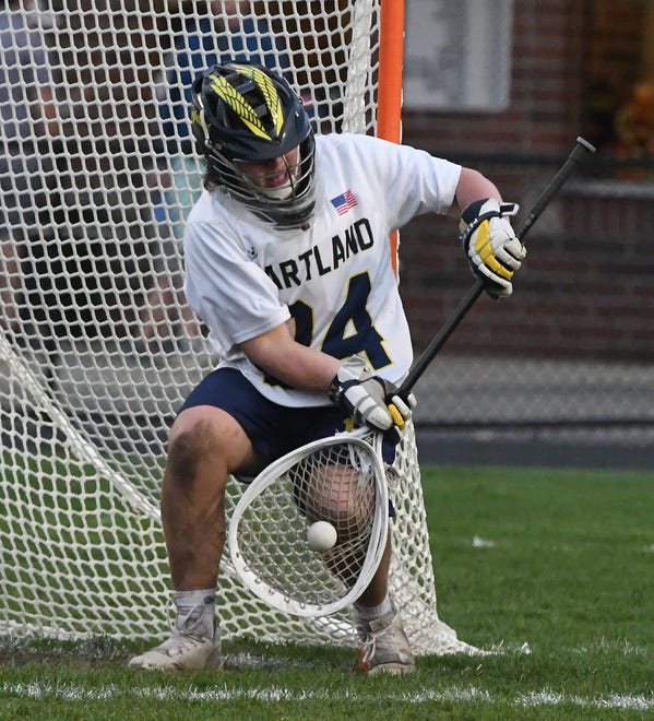 Hartland goalie Evan Phillips makes a save in the fourth quarter.