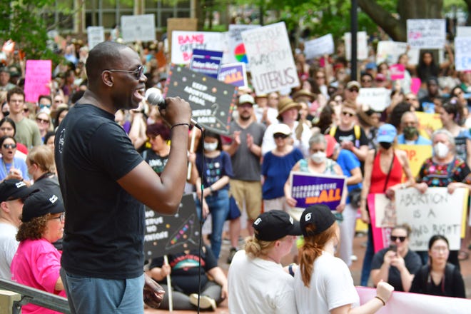 Michigan Lt. Governor Garlin Gilchrist III speaks to hundreds gathered at the University of Michigan for a planned parenthood rally on Saturday, May 14, 2022.
