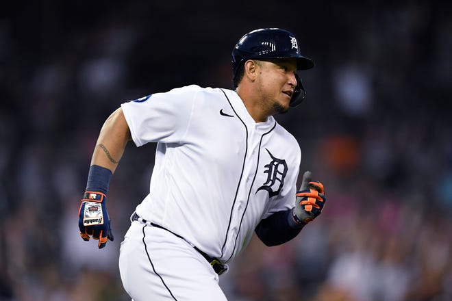 Tigers' Miguel Cabrera rounds first base after hitting a home run off Baltimore Orioles starting pitcher Jordan Lyles during the sixth inning.