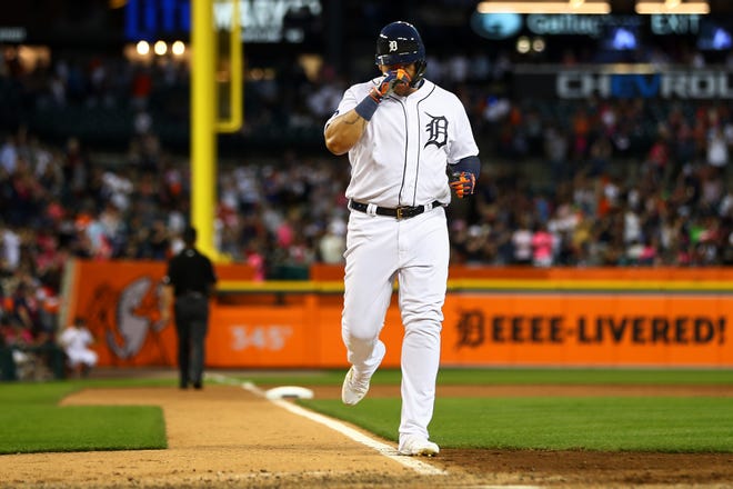 Tiger Miguel Cabrera #24 runs the bases after hitting a home run in the sixth inning.