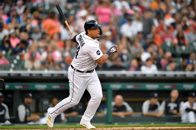 Tigers' Miguel Cabrera watches his double in the third inning.