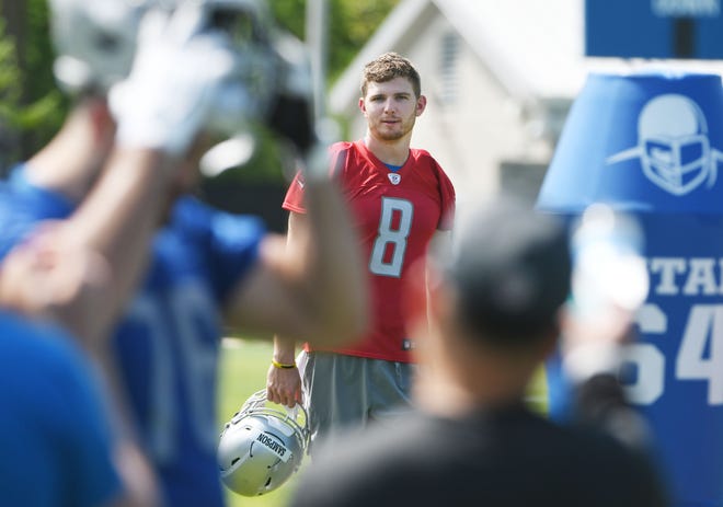 Lions rookie quarterback Connor Sampson leaves the field after minicamp.