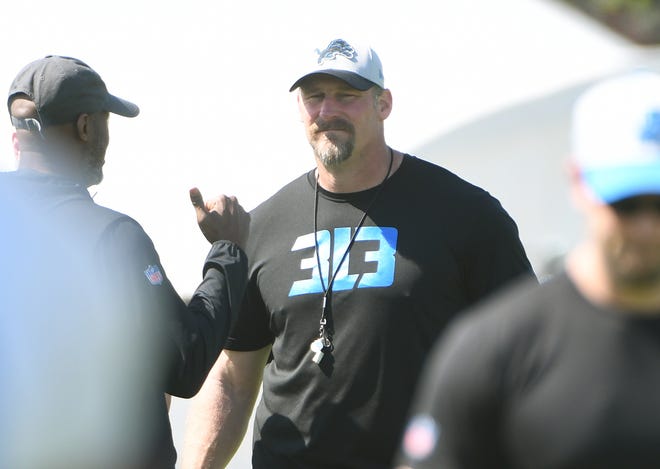 Lions executive vice president and GM Brad Holmes and head coach Dan Campbell during minicamp.