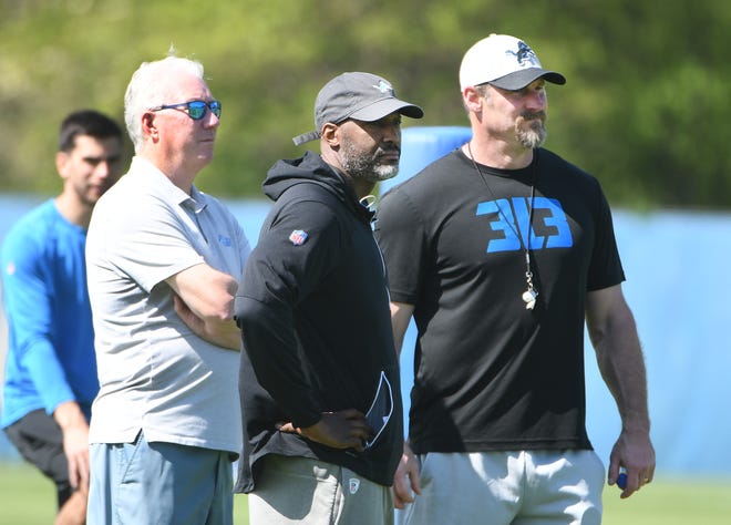 From left, Lions president and CEO Rod Wood, executive vice president and GM Brad Holmes and head coach Dan Campbell watch over minicamp.