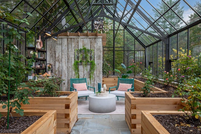 Among the many features in this Oakland County greenhouse designed by Rachel Nelson of Concetti in Detroit is a comfortable seating area. “It’s become her home away from home,” Nelson says of the homeowner.