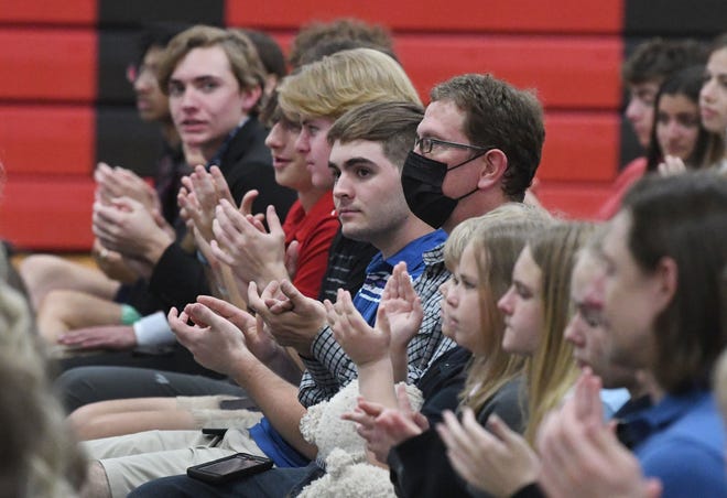 Students listen on and react as former Vice President Mike Pence and former Education Secretary Betsy DeVos address Lutheran High School Northwest students about a school of choice tax credit ballot initiative.