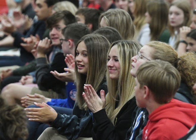Students listen on and react as former Vice President Mike Pence and former U.S. Education Secretary Betsy DeVos address Lutheran High School Northwest students about a school of choice tax credit initiative.