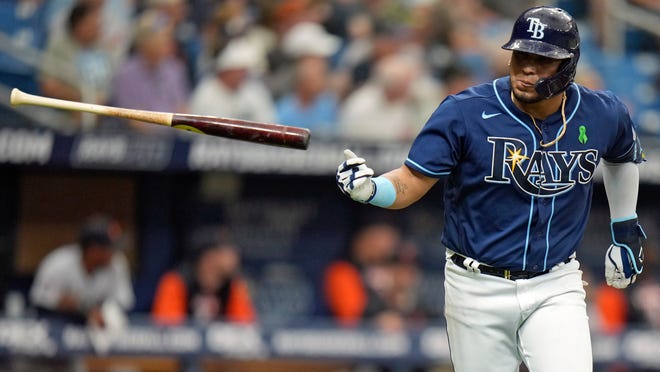 Tampa Bay Rays' Isaac Paredes flips his bat after his solo home run off Detroit Tigers' Rony Garcia during the third inning.
