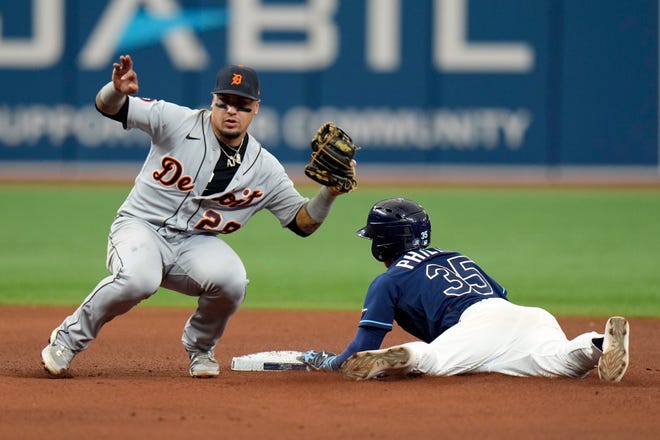 Tampa Bay Rays' Brett Phillips (35) steals second base ahead of the tag by Detroit Tigers shortstop Javier Baez (28) during the seventh inning.