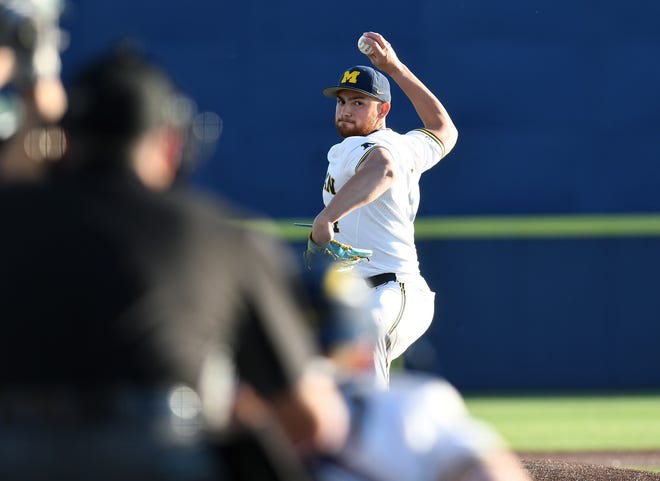 Michigan relief pitcher Ahmad Harajli throws a pitch in the fifth inning.